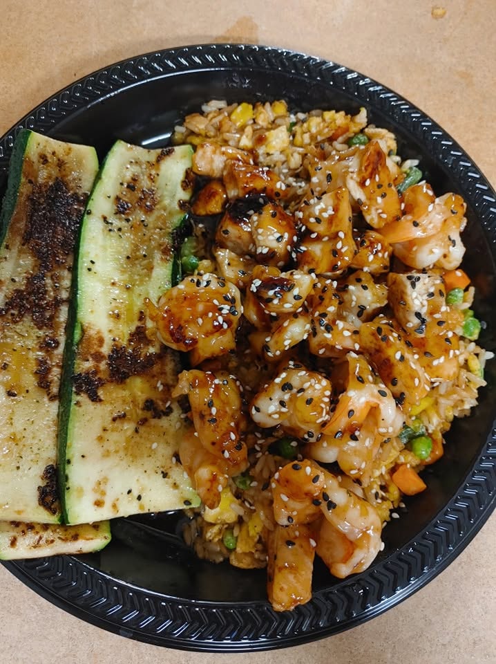 A shrimp and fried rice special with grilled zucchini from the Suwannee Belle kitchen